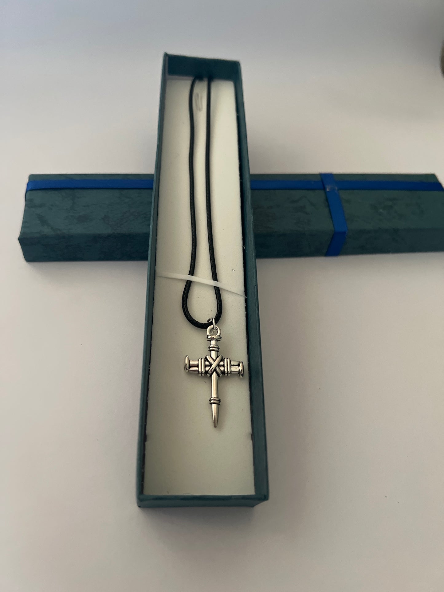 ✝️ Cross of Nails Necklace – Strength Forged in Faith